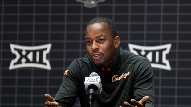 Oct 18, Kansas City, MO, USA; Oklahoma State head coach Mike Boynton answers questions at the Big 12 Men s Basketball Tipoff at T-Mobile Center. Mandatory Credit: Kylie Graham-USA TODAY Sports